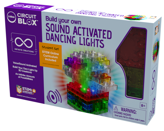 The image shows a box of "Circuit Blox™ Sound Activated Dancing Lights Student Set - E-Blox®" labeled "Build your own Sound Activated Dancing Lights." The box features colorful, translucent blocks forming a light structure and indicates it includes a student set and online STEM Foundations Curriculum. It is for ages 8 and up.