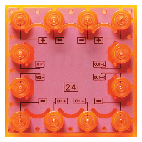 Square orange circuit board featuring various labeled terminals, including R_F, VOL, CH+, CH-, OUT-L, and OUT-R, arranged around the edges. The center is marked with the number "24." This layout suggests it's used for audio control functions within the Circuit Blox™ - FM Radio Block by E-Blox®.