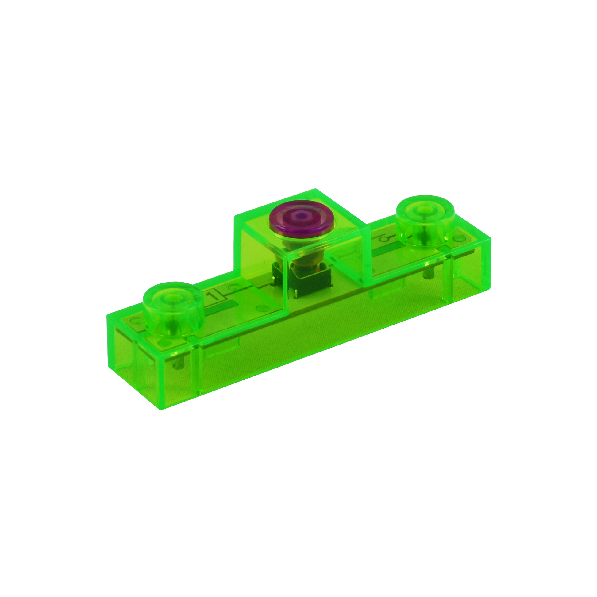 The E-Blox Circuit Blox™ 59 project Classroom Set from E-Blox includes a small, translucent green plastic building block with two round studs on top and a central raised section. The raised section features a transparent purple circular element. Ideal for STEM education projects, this piece has connectors on the bottom, typical of LEGO-compatible building blocks.