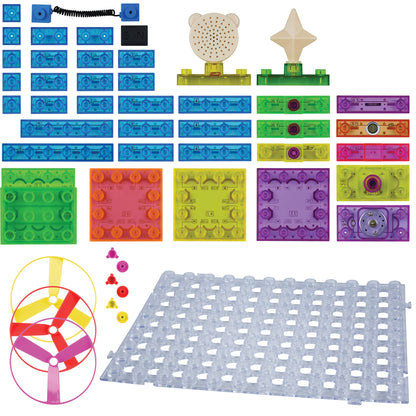 A collection of colorful components from the Circuit Blox™ 120 Project Classroom Set - E-Blox® Circuit Board Building Blocks Educational Sets arranged on a white background. Includes blue, green, and pink connectors, a perforated grid, pink and yellow propellers, a bear-shaped speaker, and various sensors and control units in line with NGSS requirements from the trusted brand E-Blox.