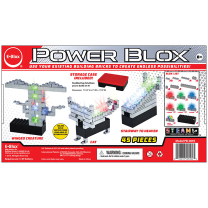 The image shows a box of Power Blox™ Standard Set - E-Blox® Student Set, containing 45 pieces designed to create various structures using patented technology. The box features images of sample builds such as a winged creature, a cat, and a stairway to heaven. It emphasizes creativity, aligns with the STEM curriculum, and includes a storage case.