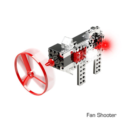 A fantastic creation titled "Fan Shooter" from the Power Blox™ Light 'N Flight 5-in-1 Classroom Set by E-Blox features a mechanical structure with a prominent red wheel on one side and a glowing red light on the other. This build, ideal for augmenting LEGO sets, incorporates black, white, and red pieces and stands on four legs.