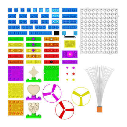 A neatly arranged collection of colorful building block pieces and accessories from the Circuit Blox™ 395 Project Classroom Set - E-Blox® Circuit Board Building Blocks Educational Sets by E-Blox, displayed on a white background. The set includes an array of shapes, sizes, and colors of blocks, wheels, a white grid board, and other parts designed for creative construction that align with Advanced STEM Concepts.