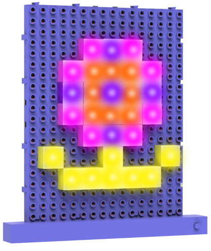 A colorful pixel art flower, crafted with Lite Blox 2 from E-Blox, Inc., is displayed on a purple pegboard. The flower features a vibrant pink and orange bloom with a yellow stem and leaves. All elements glow brightly thanks to LED Blox technology, creating a cheerful and playful light-up picture.