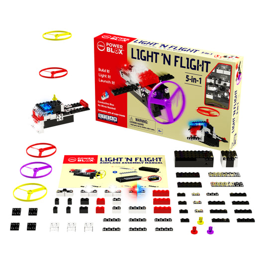 The E-Blox Power Blox™ Light 'N Flight 5-in-1 Student Set, designed to meet NGSS requirements, includes various pieces such as bricks, gears, and rotors. The set's box, instruction manual, colored lights, and other components are displayed against a white background. Perfect for any STEM curriculum.