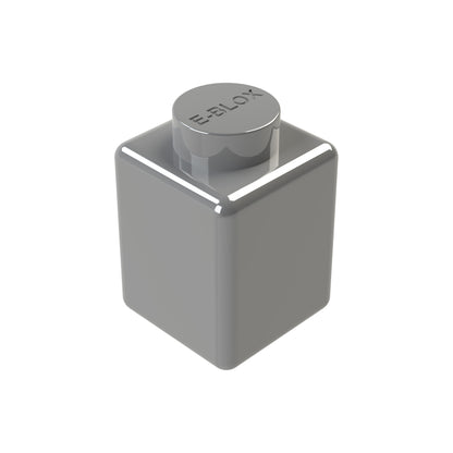 A metallic gray 1x1 cube interlocking Block featuring a cylindrical top, smooth tin surface, and engraved with "E-Blox.