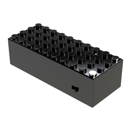 A black, rectangular LEGO brick featuring a 4x10 stud arrangement is showcased against a white background. The glossy surface, adorned with evenly spaced circular studs on top, hints at its versatility in creating dynamic builds. This potential is further enhanced when combined with the E-Blox® - Power Blox™ Battery Block from E-Blox for added illumination.