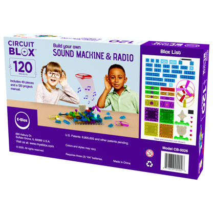 The Circuit Blox™ 120 Project Student Set - E-Blox® Circuit Board Building Blocks Educational Sets from E-Blox comes in a purple box and includes 120 pieces for building a sound machine and radio. The packaging features images of two smiling children, colorful blocks, and a list of components. It is an excellent tool for teaching STEM concepts while meeting NGSS requirements. Note that three AA batteries are required (not included) and can be found at the bottom right corner of the box.