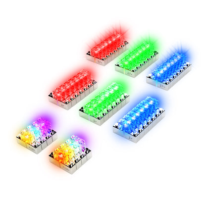 A series of colorful LED Power Blox™ mechanical switches by E-Blox® are arranged in a grid. Each switch emits a different color such as red, green, blue, pink, and multicolor variations. With translucent housing that allows the vibrant lights to shine through, it functions like a creative toy that's perfect for any STEAM curriculum.