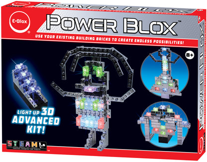 The image shows a red product box labeled "Power Blox™ Advanced Set" by E-Blox®. It displays an LED light-up 3D building kit for ages 8 and up, integrating toy brick sets and 3D circuits. The box features images of completed light-up designs, emphasizing "endless possibilities" for creation within the STEAM curriculum.