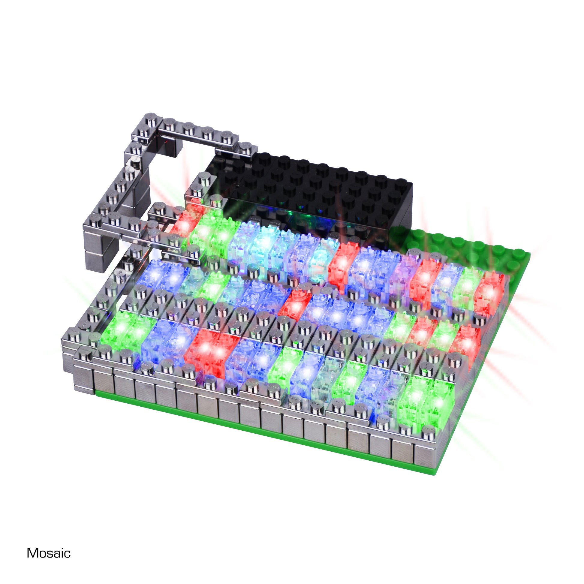 The Power Blox Flashing Frenzy by E-Blox features an array of colorful, illuminated bricks arranged in red, green, and blue sections. The design includes raised gray structures around the edges and a raised black section at the top, highlighting its integration with STEM curriculum principles.