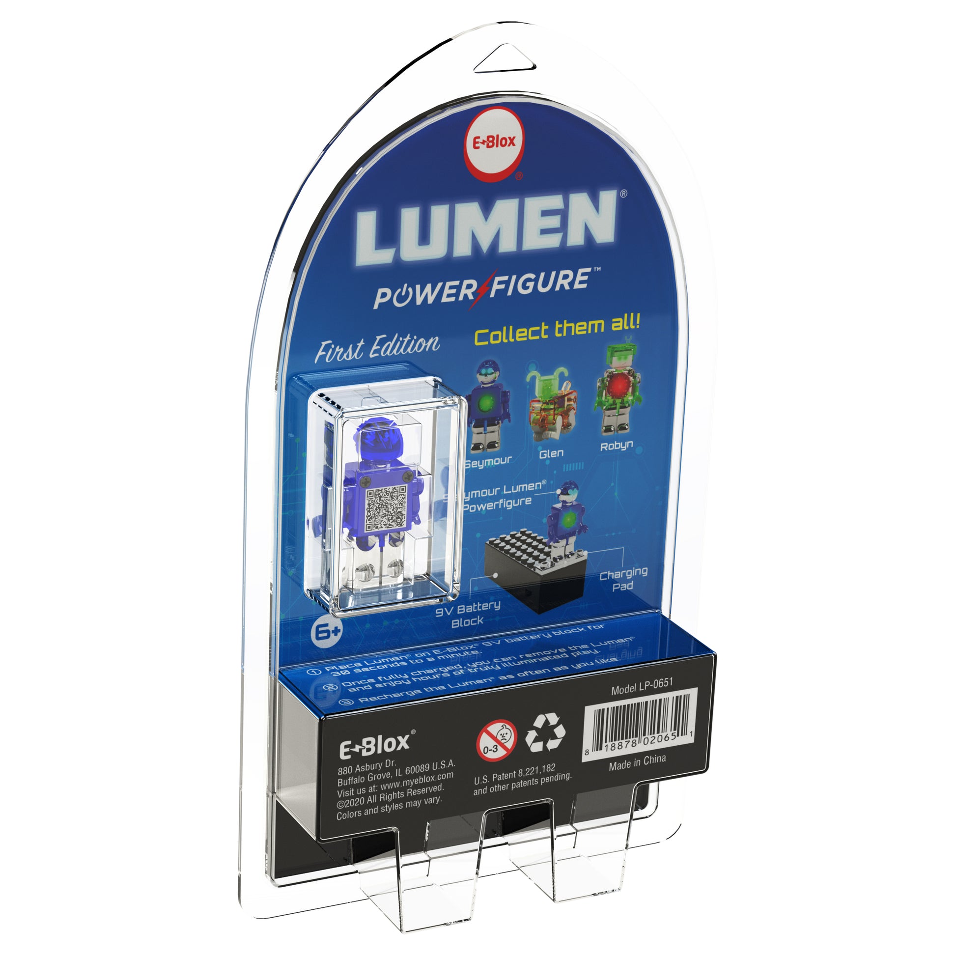 The image showcases the packaging of a LUMEN®- Seymour - Illuminated Mini Figure by E-Blox, Inc. The front of the package features the illuminated Seymour Mini Figure™, accompanied by a grid-like accessory, a black base, and a charging pad. The packaging also highlights other collectible characters and various product details from the LUMEN® series.