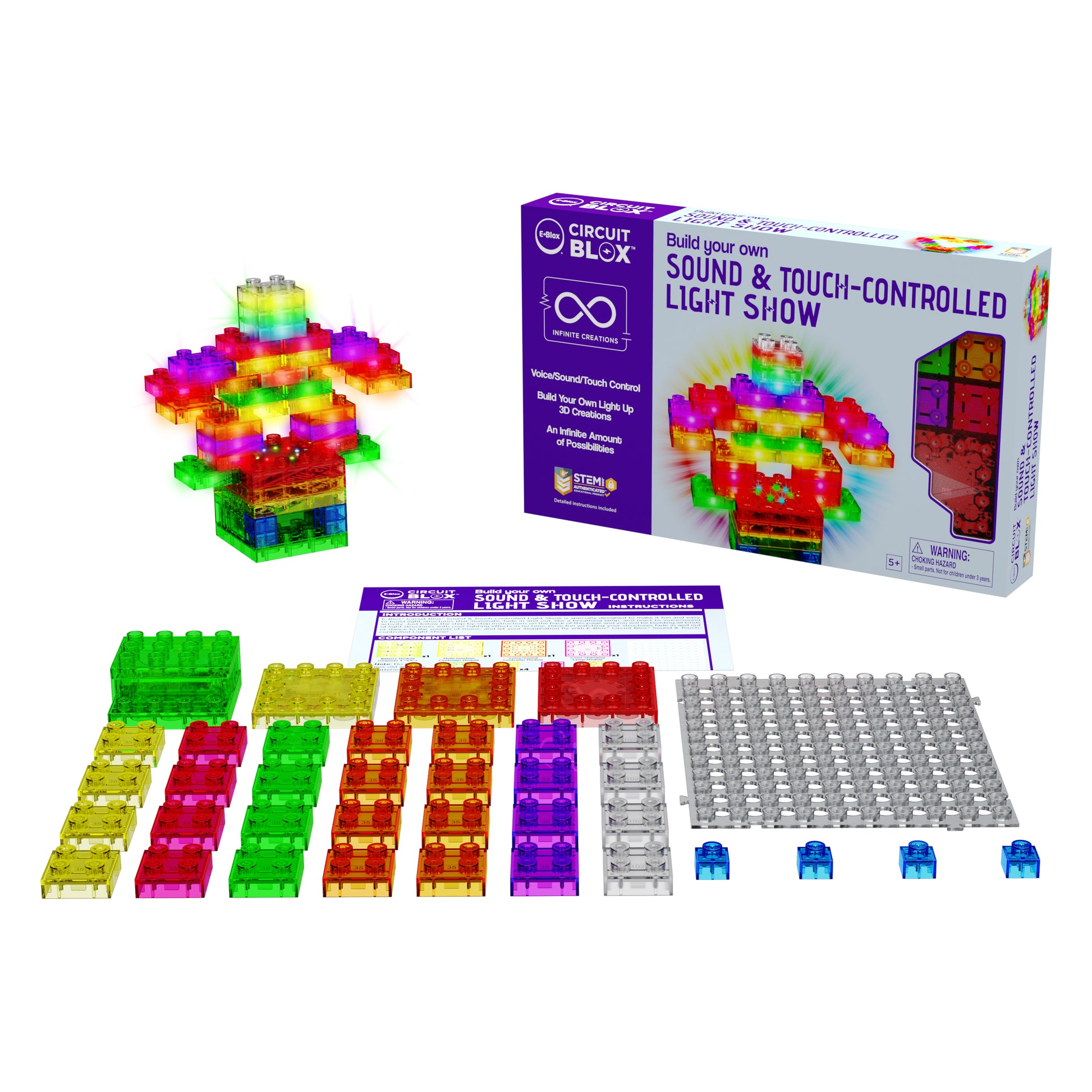 A colorful building block kit displayed on a white background. The assembled light-up structure, featuring LED blocks that emit vibrant colors, sits beside its box, which reads "E-Blox: Circuit Blox™ Sound & Touch-Controlled Light Show." Various translucent blocks and a controller module are spread around.