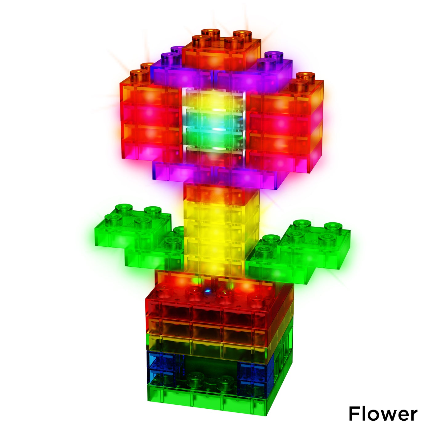 A vibrant flower crafted from translucent, interlocking LED blocks from E-Blox’s Circuit Blox™ Sound & Touch-Controlled Light Show is illuminated from within. The flower displays a red and purple blossom, green leaves, and a yellow and green stem, all radiating brilliantly against a plain white background with the word "Flower" in the bottom right corner.