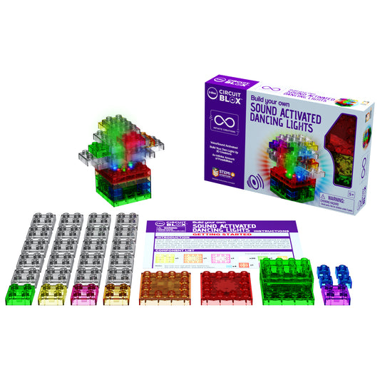A STEM toy kit titled "Circuit Blox™ Sound Activated Dancing Lights - E-Blox®" with components laid out, including colorful interlocking plastic blocks, electronic parts, and an instruction manual. The box features an image of a vibrant light display and showcases the innovative sound-activated module for educational play by E-Blox.