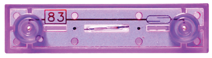 Close-up view of a purple audio cassette tape with the number "83" in red text on a white background displayed in the top left corner. The transparent tape reveals inner mechanisms, reminiscent of the intricate design found in E-Blox's Reed Switch Block for Circuit Builder.