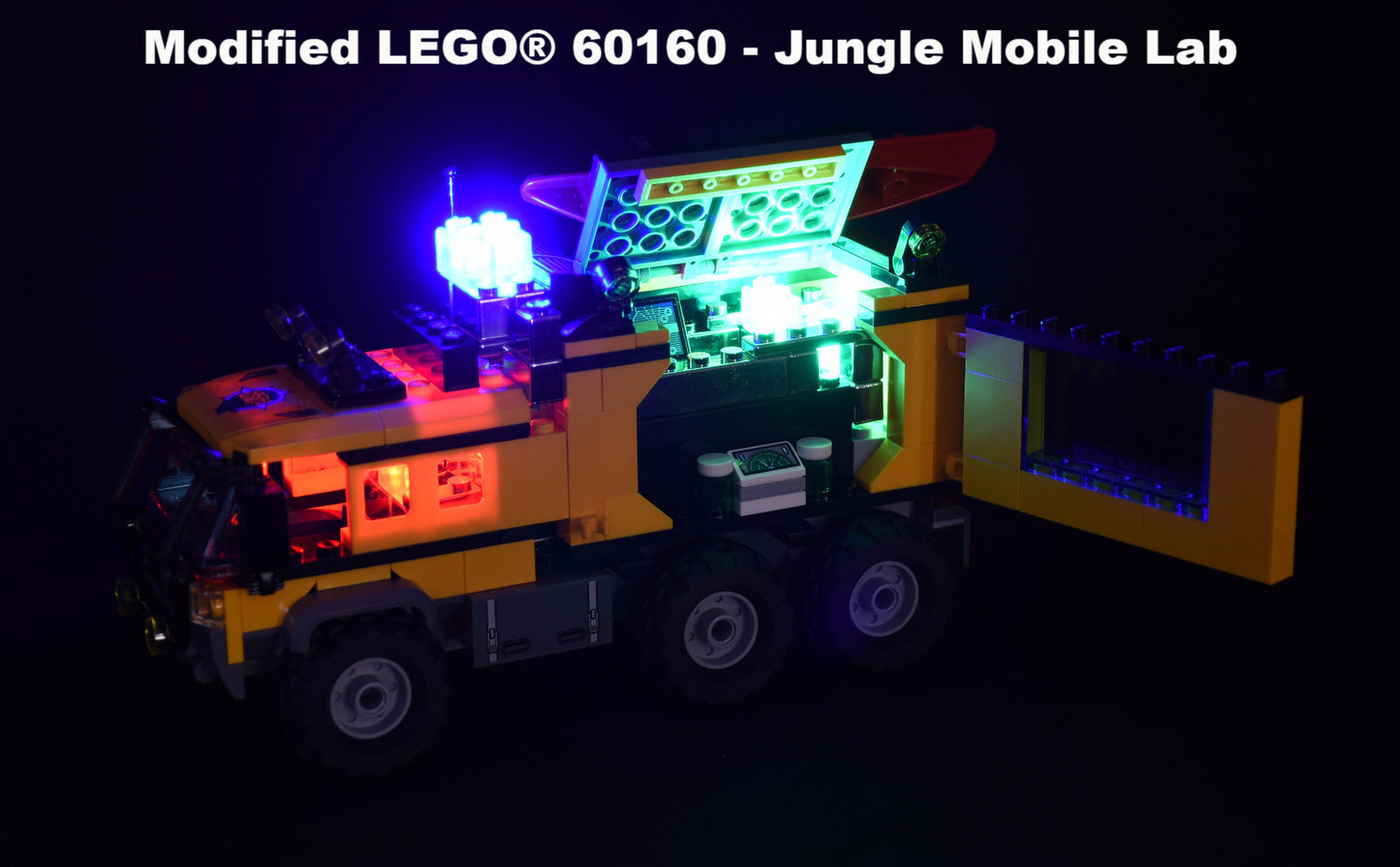 A modified LEGO® Jungle Mobile Lab (60160), upgraded with the E-Blox Power Blox™ Starter Set - LED Building Blocks from E-Blox, illuminated with vibrant colored lights. The truck's interior and exterior showcase glowing red, blue, green, and yellow lights, highlighting its intricate design details and modifications—a perfect addition to any STEAM curriculum.